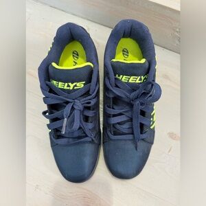 Heeleys blue and neon green shoes